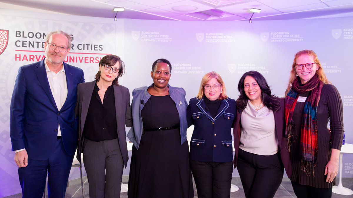 Panelists smiling and posing for a photo.