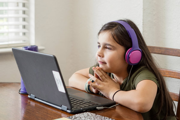 child sitting at laptop.jpg