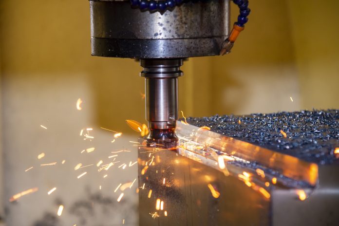 The burning chip from CNC milling machine rough cutting by index-able end-mill tools. The bad cutting condition from machining center make tool wear and heating chip, representing the need for a manufacturing strategy