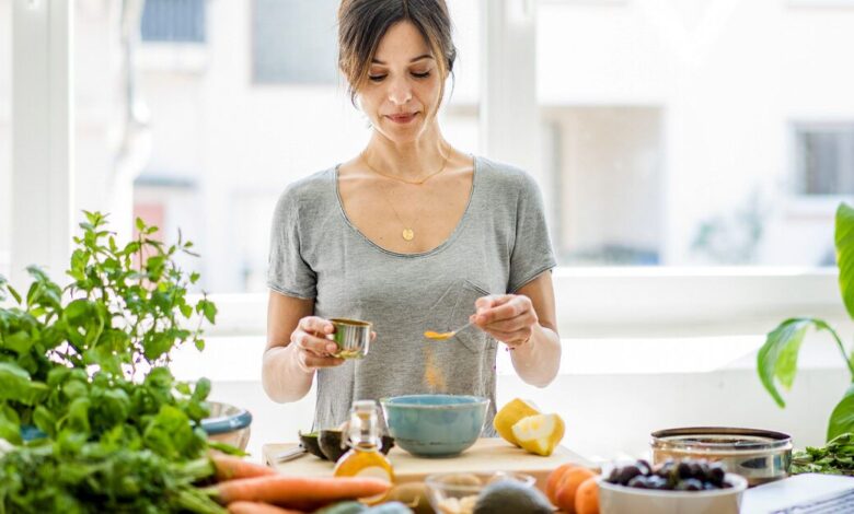 Woman preparing healthy food x facebook x.jpg