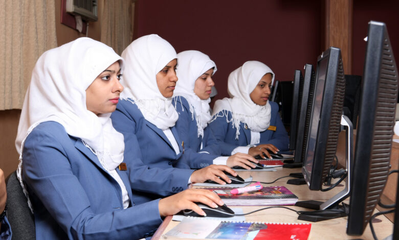 Women following a training on computers.jpg
