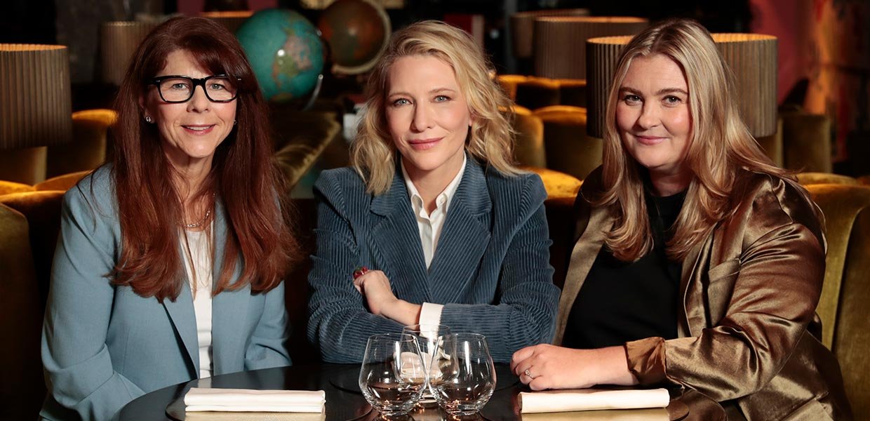 Dr. Stacy L. Smith, Cate Blancette and Coco Francin sitting together 